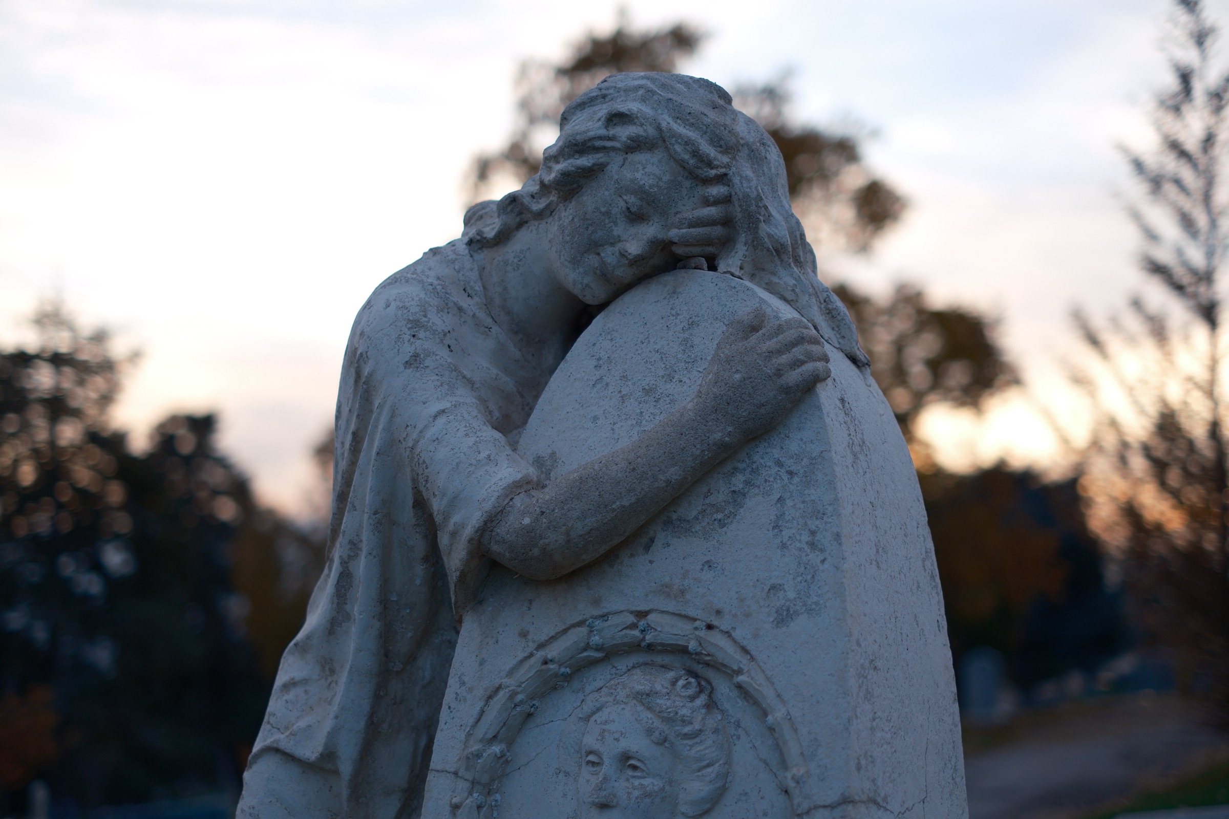 Mourning cemetery statue